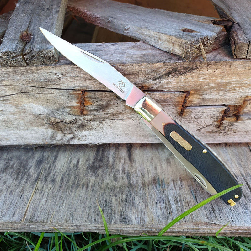 knife with pick and tweezers